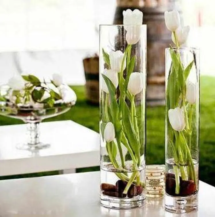 Cómo decorar jarrones de cristal con flores artificiales